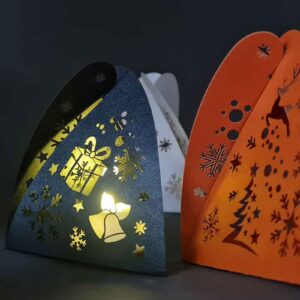 Leuchtende Weihnachtskarte mit Lasercuts